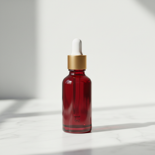 Botanical Facial Serum — Ruby Red variant, marble background